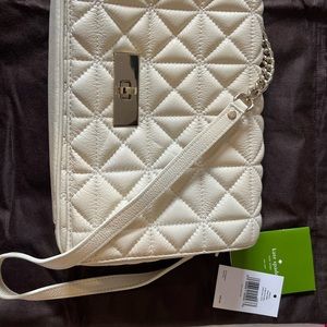 Kate Spade Delaney Sedgewick Place bag in palecream. Used once comes with tag